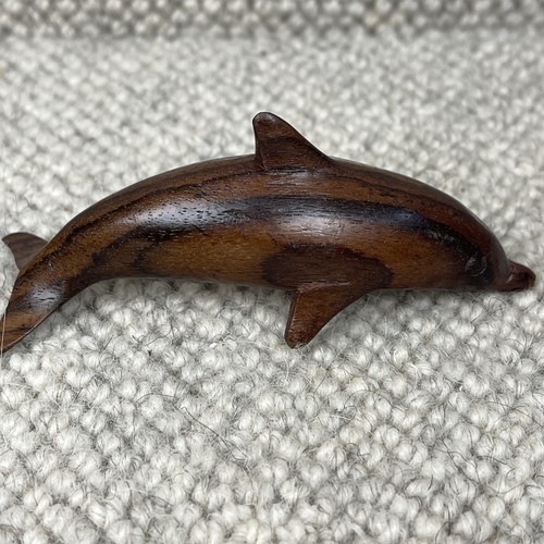Hand carved wood - hand, dolphin