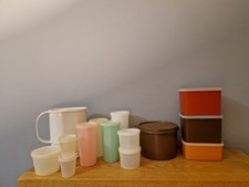 12 Items Of Vintage Tupperware. Tubs, Cups And Tea Caddy.