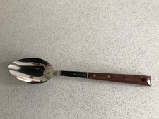 Vintage Prestige serving spoon, stainless steel with wooden handle.