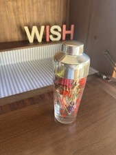 Vintage Cocktail Shaker With Recipes and Kitsch Umbrellas Flowers 1970s bar