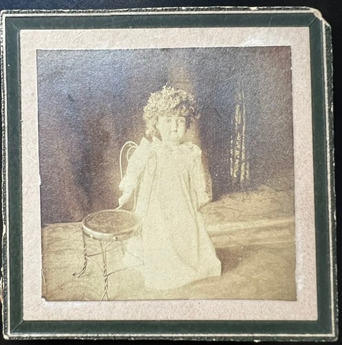 Haunting doll stands beside - doll,