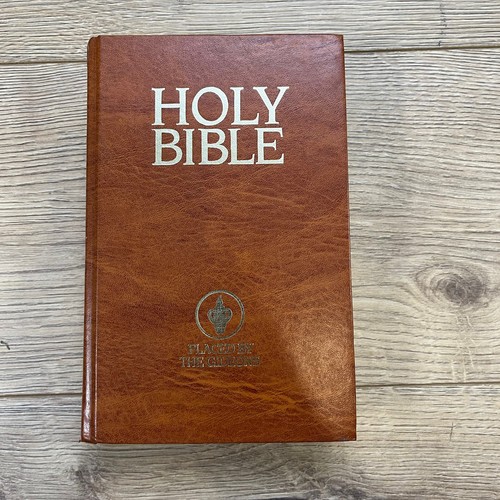 Holy bible placed the - by,