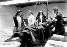 WWI Wounded man lowered onto a barge-ambulance 1914 OLD PHOTO