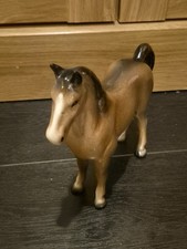 Brown Porcelain Horse Figurine