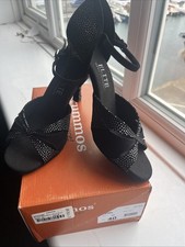 Stunning New In Box. Rummos