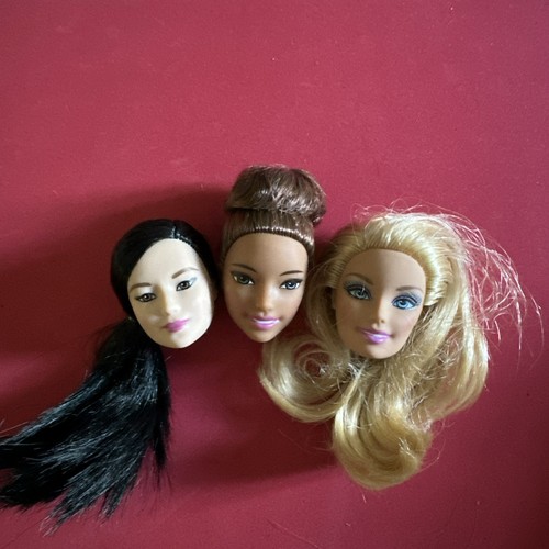 Barbie doll heads - 3,