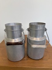 Pair vintage French milk churns