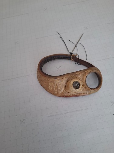 Sail makers palm with needles