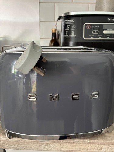 Broken quite new toaster - broken,