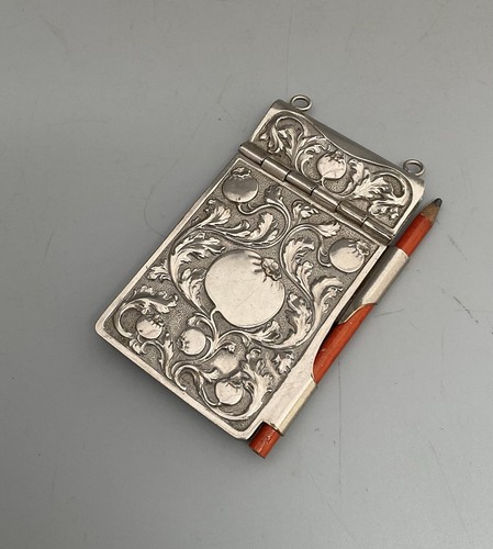 Small silver tone plated metal - tone,