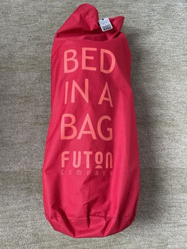 Futon company bed - in, a