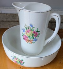 Vintage French Ceramic Wash Jug and Wash Bowl with vibrant flower design.