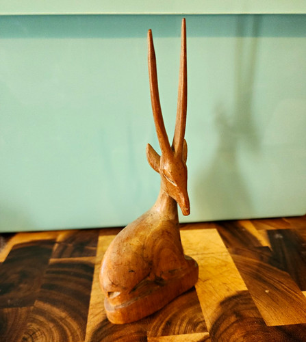 Hand carved wooden antelope - hand,