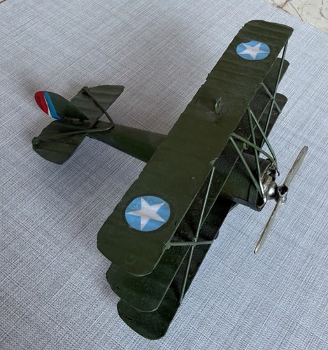 Green metal military biplane - metal,