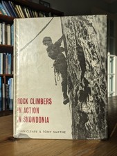 Rock Climbers In Action In