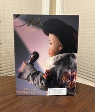 Marie Osmond Presents Dolls To