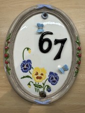 House Number 67 Sign and Wall