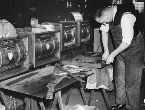 Workman making night - , at