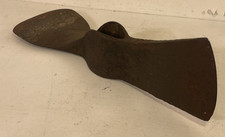 An antique hand forged mattock