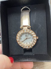 Elizabeth Taylor White Diamonds wrist watch. Pink/copper color.  New. 1.25 in.
