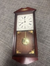 Emperor Quartz Wall Clock With a pendulum