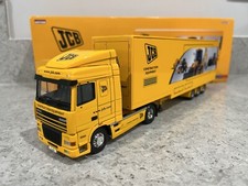 Corgi - DAF XF w/Tri-Axle Exhibition Unit Trailer - JCB - CC13237 - 1:50 - Mint