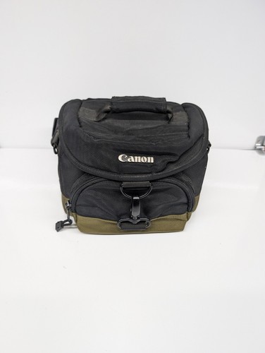 Canon 100eg camera lens gadget - camera,