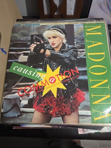 Madonna causing a commotion - causing,