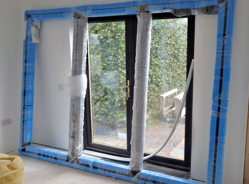 Bi-Fold door finished in