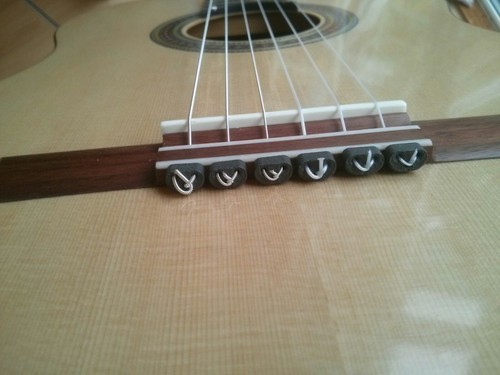 Guitar string beads for