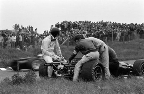 Dan gurney sits - dan, his