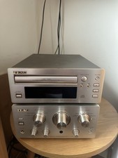 Sound System: TEAC PD-H300 Disc Player, A-H300 Amp