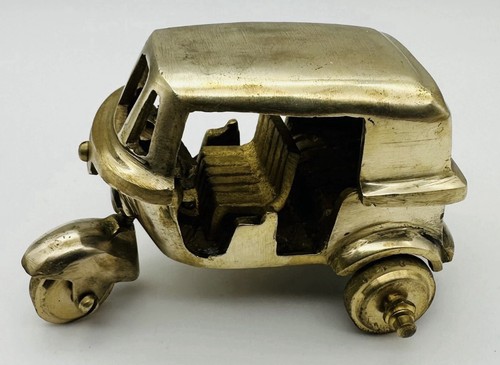 Vintage brass tuk - tuk, rickshaw