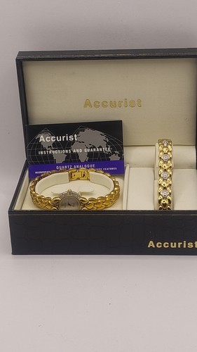 Gold tone ladies - tone,