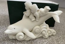 Snowbabies ride the waves - snowbabies,