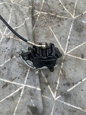 TRIUMPH BONNEVILLE T100 865 EFI FRONT BRAKE CALIPER 