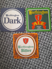 Three Worthington Brewery Beermats