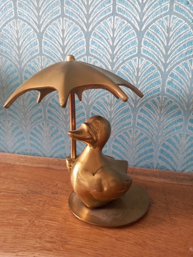 Vintage brass duck sheltering - vintage,