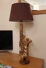 Gold Saxophone table lamp with round walnut base