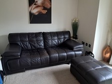 TWO Brown Leather Sofas and Storage Footstool Good Condition Collection Only M27