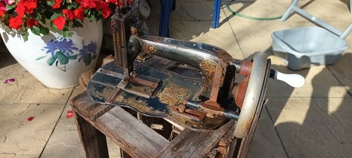 Antique hand crank fiddle base - hand,