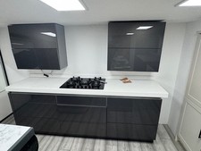 German Kitchen Anthracite gloss Corian worktop push open drawers Aventos wall