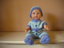 Hand knitted doll's clothes