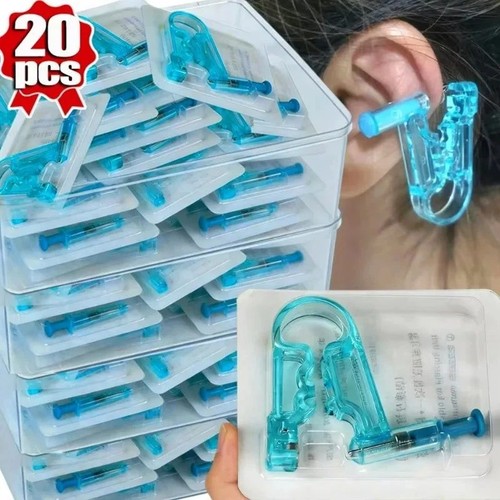 Sterile ear piercing gun - ear,