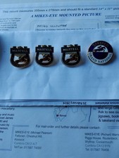 Four Grand National Badges