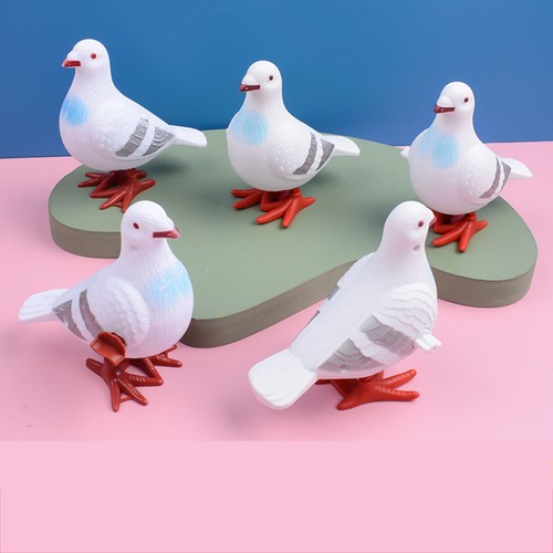 Clockwork bird toy winding - clockwork,