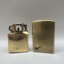 ZIPPO LIGHTER - SOLID BRASS WITH MOTIVE - PIPE VERSION -NEVER STRUCK -2000 -NICE