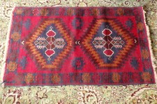 An Old *** Middle Eastern *** Rug  140cm x 82cm