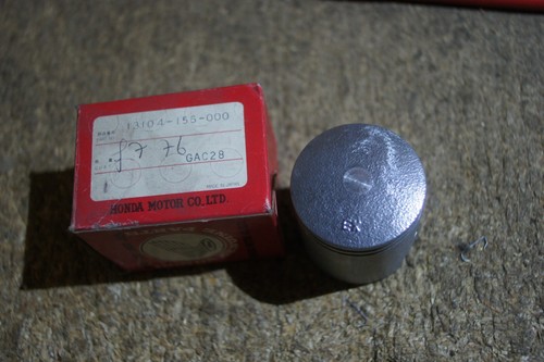 Honda genuine nf75 piston - honda,