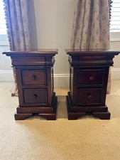 2x mahogony bedside cabinets with 3 drawers, good condition with a few small one